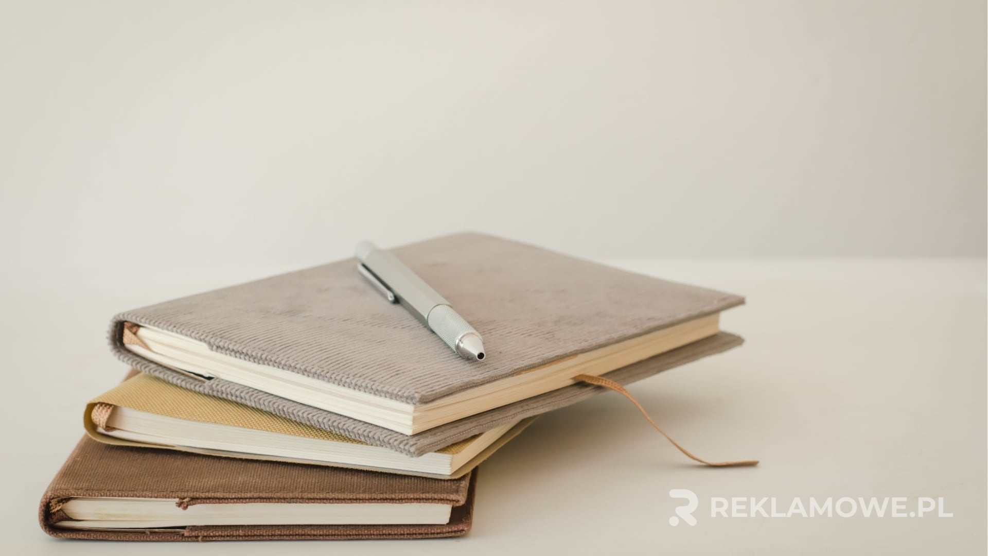 Projektowanie notesów reklamowych opowiadających historię marki